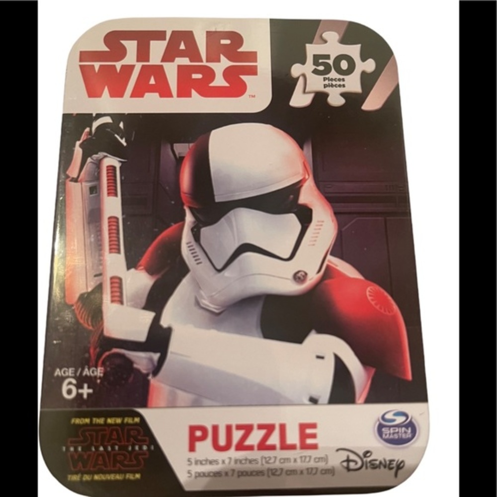 Star Wars 50 Piece Puzzle Comes In a Tin Holder.